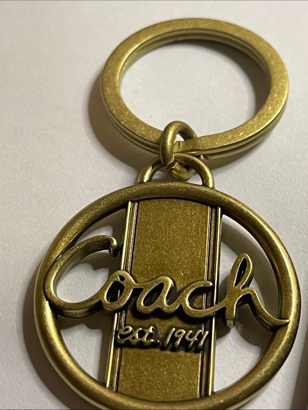 Coach Gold-Tone Circular Logo Keyring and Coach Pen